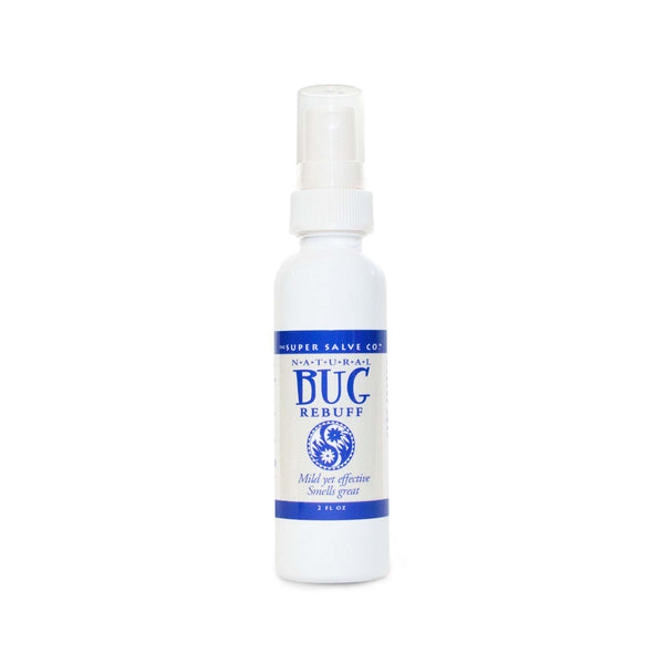 A white spray-top bottle of natural insect repellent and bug spray from The Super Salve Co. is seen against a white backdrop at the Winter Sun Trading Co.