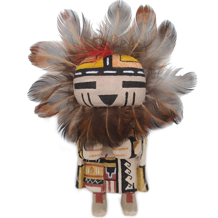 A Sun Kachina Doll against a white background