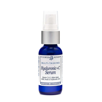 A blue 1 ounce pump bottle of Power Repair Multi-Tasking Hyaluronic + C Serum by Sister Creations is seen against a white background