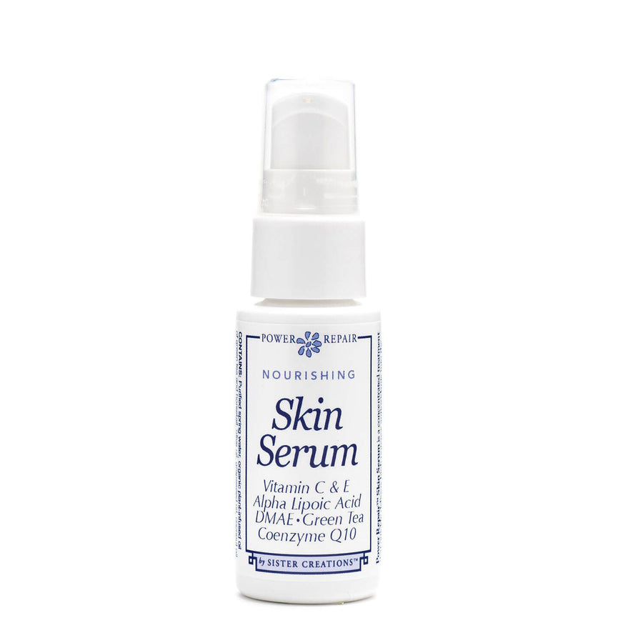 A 1 oz. bottle of Power Repair Nourishing Skin Serum  by Sister Creations is seen on a white background.