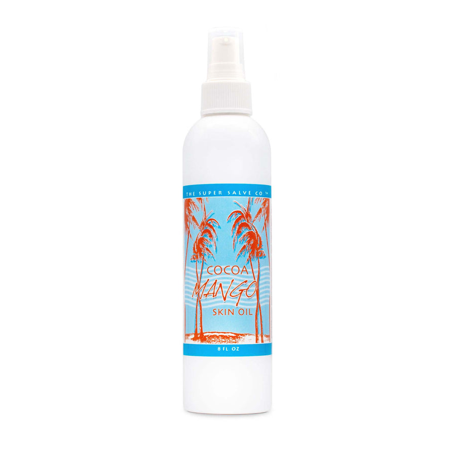 An 8 oz. white plastic bottle of Cocoa Mango Skin Oil from The Super Salve Co. is seen against a white backdrop at Winter Sun Trading Co.